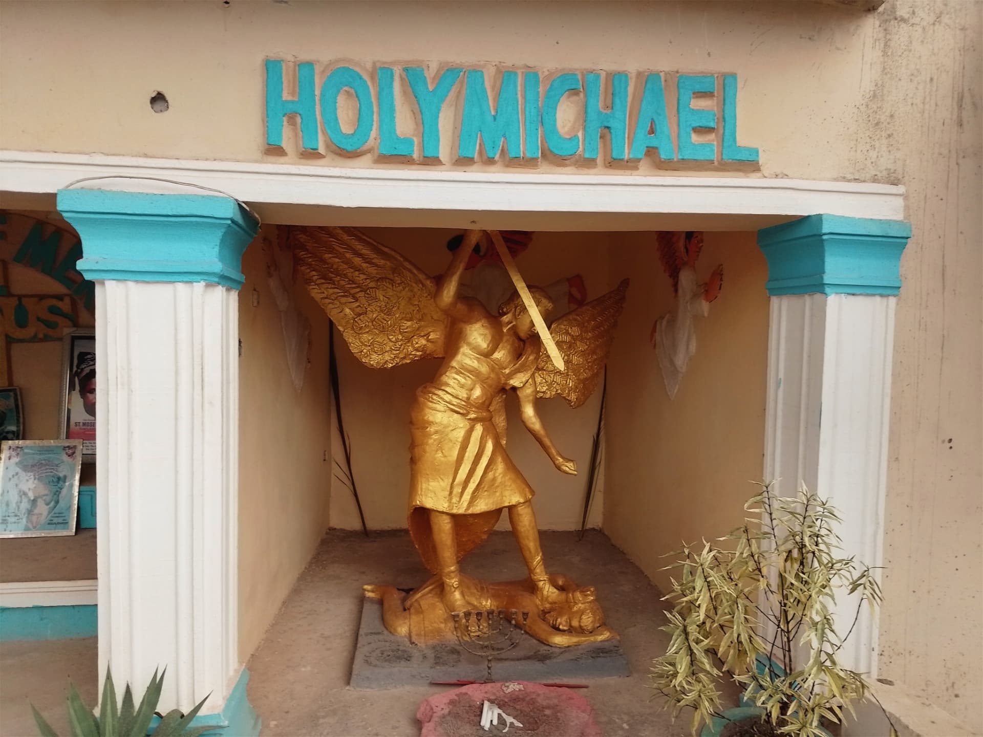 Golden statue of Holy Michael the Archangel at the church shrine